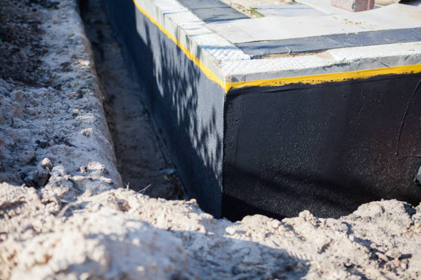 Professional Waterproofing technician working in Pioneer, OH